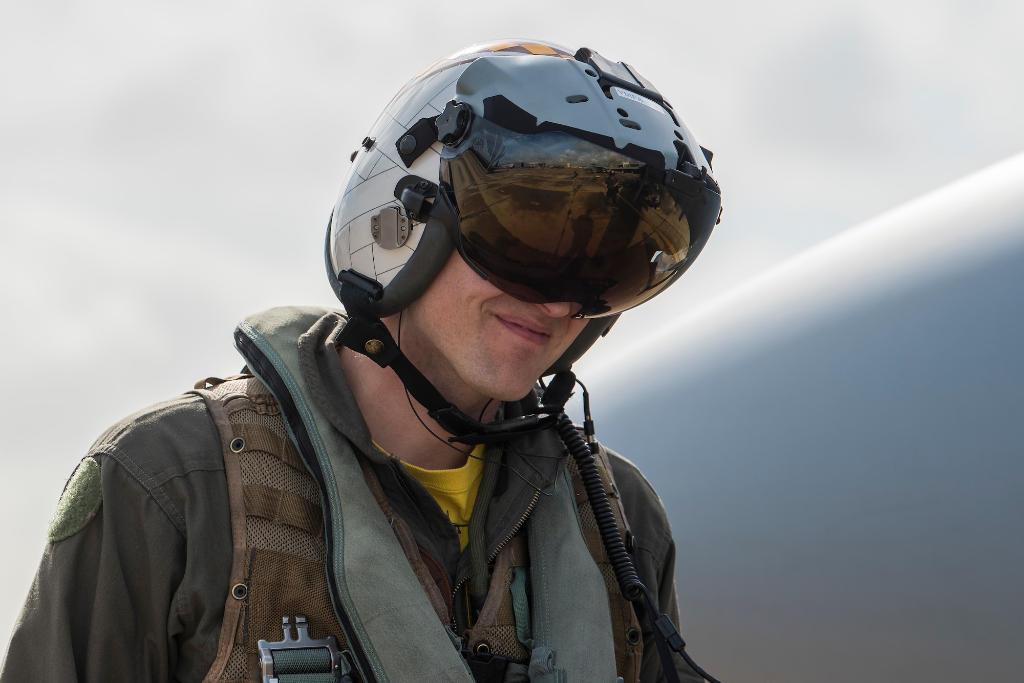 U.S. Marine Corps Maj. Matthew Andrews, 323nd Marine Fighter Attack Squadron pilot, walks to an F/A-18C Hornet during joint exercise Winter Fury at Marine Corps Air Station Miramar, San Diego, Calif., Jan. 18, 2019. Winter Fury involved both Marine F/A-18C Hornets, and Navy F-35C Lightning II’s, partnering with Air Force F-22 Raptors to perform air-to-air combat, while protecting ground assets.