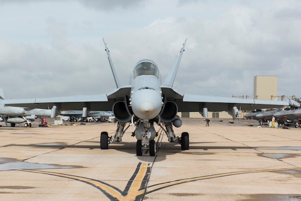 A U.S. Marine Corps F/A-18C Hornet taxis onto the runway during joint exercise Winter Fury at Marine Corps Air Station Miramar, San Diego, Calif., Jan. 18, 2019. Winter Fury involved both Marine F/A-18C Hornets, and Navy F-35C Lightning II’s, partnering with Air Force F-22 Raptors to perform air-to-air combat, while protecting ground assets.