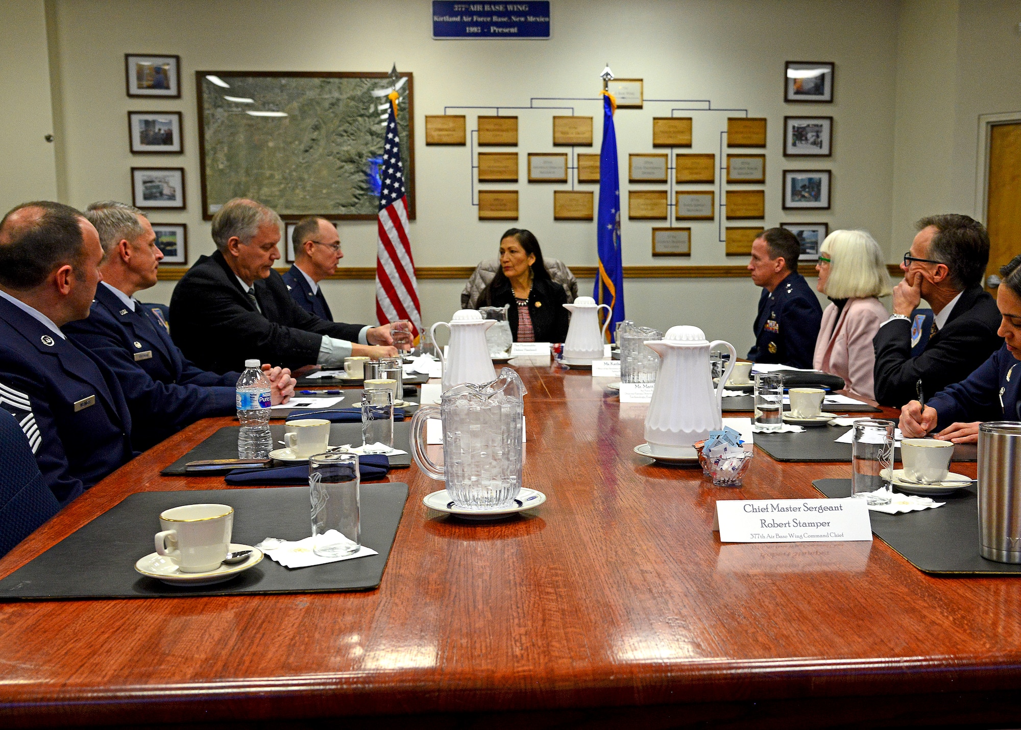 U.S. Congresswoman Deb Halland (D-New Mexico) talks with Col. Richard Gibbs, 377th Air Base Wing commander, and Kirtland leadership during a visit to Kirtland Air Force Base Feb. 5, 2019. Halland attended a briefing and visited key base locations during her visit. (U.S. Air Force photo by Jessie Perkins.)