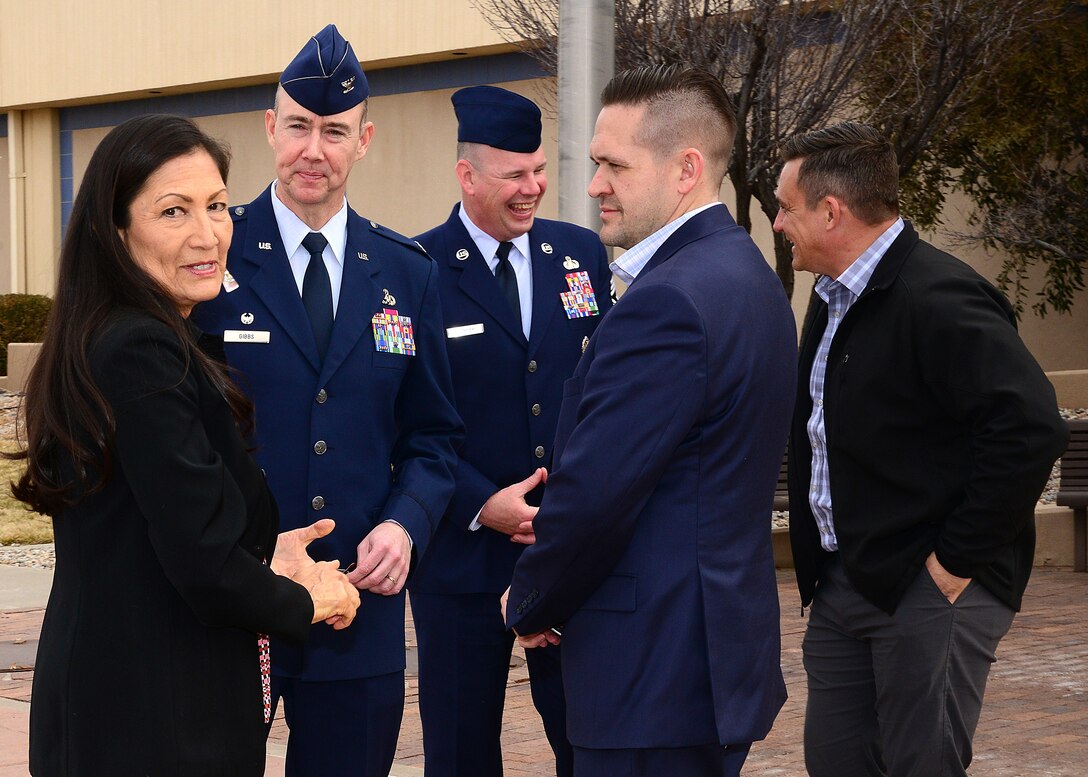 U.S. Congresswoman Deb Halland (D-New Mexico) talks with Col. Richard Gibbs, 377th Air Base Wing commander, and Kirtland leadership during a visit to Kirtland Air Force Base Feb. 5, 2019. Halland attended a briefing and visited key base locations during her visit. (U.S. Air Force photo by Jessie Perkins.)
