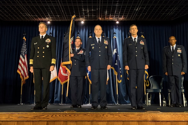 U.S. Navy Adm. Philip S. Davidson, commander, U.S. Indo-Pacific Command, (left), prepares to transfer command of United States Forces Japan from U.S. Air Force Lt. Gen Jerry P. Martinez, (center), to U.S. Air Force Lt. Gen. Kevin B. Schneider (right), at Yokota Air Base, Japan, Feb. 5, 2019. Schneider previously served as the chief of staff, United States Indo-Pacific Command. (U.S. Air Force photo by Senior Airman Donald Hudson)