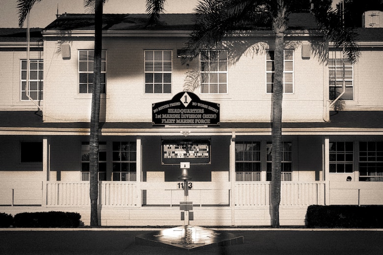 The photo depicts the 1st Marine Division Headquarters Building on Marine Corps Base Camp Pendleton, California, May 17, 2018.