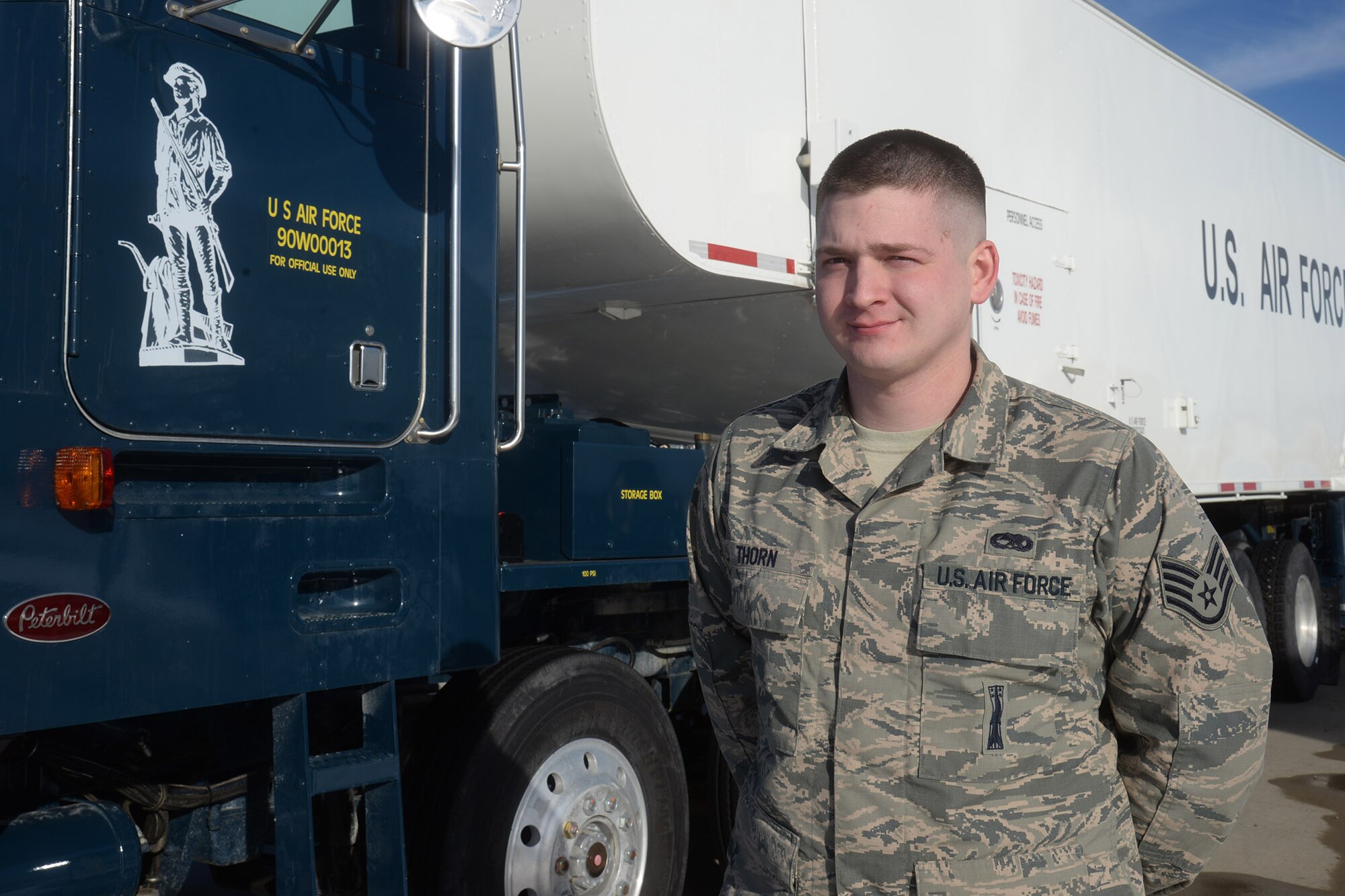 Staff Sgt. Matthew Thorn, 341st Missile Maintenance Squadron team chief trainer, stands next to a transporter-erector Jan. 30, 2019, at Malmstrom Air Force Base, Mont.