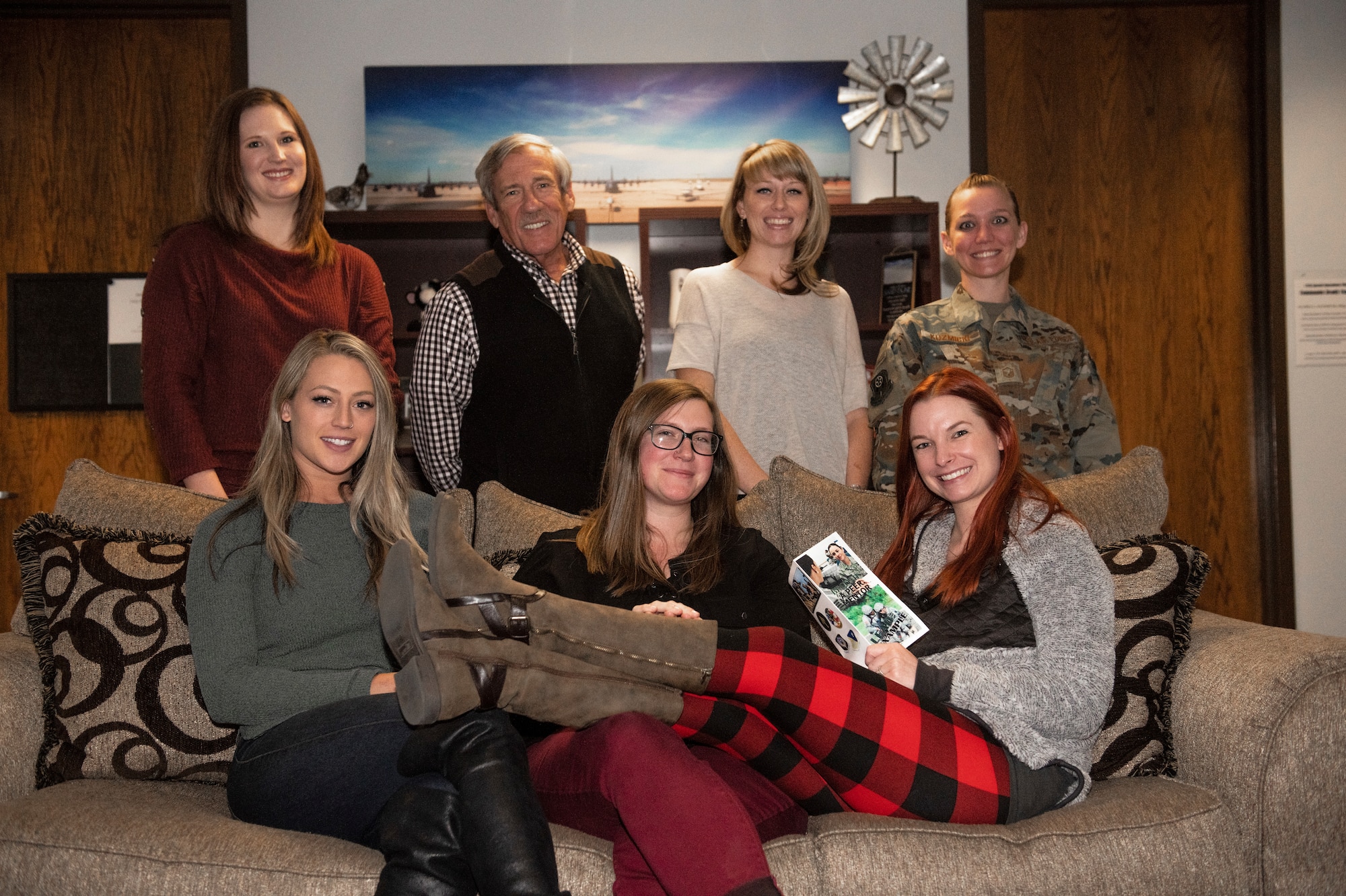 Preservation of the Force and Family specialists pose for a photo at Cannon Air Force Base, N.M., Dec. 7, 2018. The POTFF program keeps core concepts in check for Airmen. Staying proactive, they work on being the catalyst to direct Airmen where they need to go. (U.S. Air Force photo by Senior Airman Lane T. Plummer)