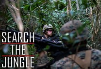 Sgt. Marrissa Ladwig searches for the enemy during a patrol Jan. 30, 2019, at Jungle Warfare Training Center, Camp Gonsalves, Okinawa, Japan. The purpose of the Jungle Warfare Training Center is to teach Marines survival skills needed for the jungle, as well as build unit cohesion and small unit leadership. Ladwig is a data systems administrator with Data Systems Platoon, Communications Company, Combat Logistics Regiment 37, 3rd Marine Logistics Group. Ladwig is a native of Custer, Montana. (U.S. Marine Corps photo by Lance Cpl. Terry Wong)