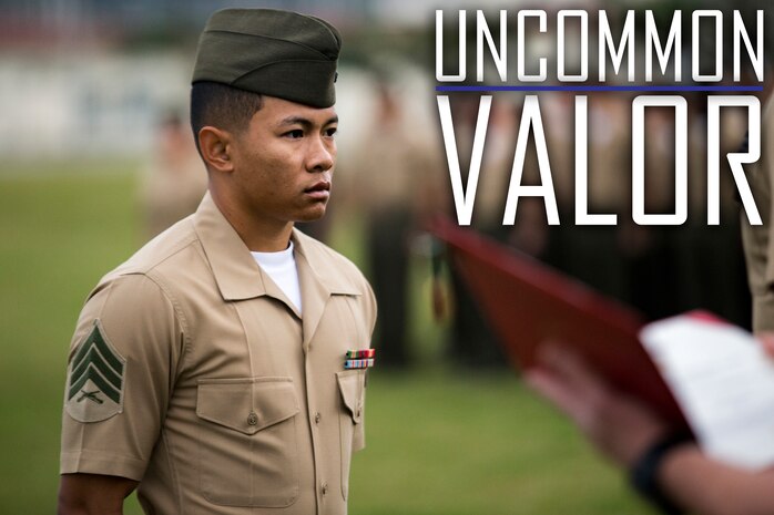 Sgt. David Lam receives the Navy and Marine Corps Achievement Medal on Camp Foster, Okinawa, Japan, Feb. 1, 2019. Lam received the medal for his fast response in aiding a U.S. Airman who was in a motorcycle accident on Dec. 31, 2018. Lam, an assistant warehouse chief with 3rd Transportation Support Battalion, Combat Logistics Regiment 3, 3rd Marine Logistics Group, is a native of San Jose, California. (U.S. Marine Corps photo by Lance Cpl. Armando Elizalde)