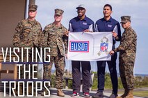 NFL alumni Donnie Edwards, center right, and Steven Jackson, center, visited Marines and Sailors Feb. 3, 2019, at the USO on Camp Kinser, Okinawa, Japan. The USO invited Edwards and Jackson to tour the military installations on Okinawa, Japan in order to visit service members and boost morale during the height of the football season. (U.S. Marine Corps photo by Lance Cpl. Mark Fike)
