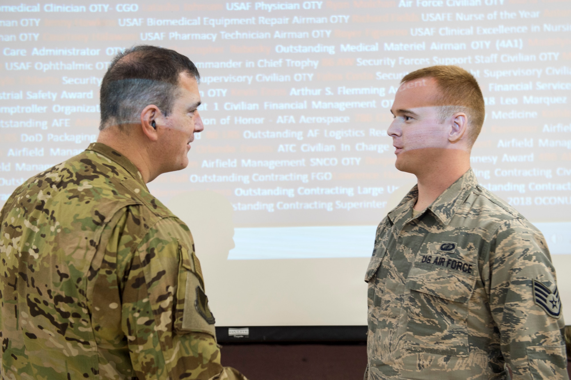 U.S. Air Force Staff Sgt. Zachary Roll, 496th Air Base Squadron financial technician (right) thanks U.S. Air Force Brig. Gen. Mark R. August, 86th Airlift Wing commander (left),after being coined by August on Moròn Air Base, Spain, Jan. 31, 2019. Roll was recognized by August as one of the 86th AW’s Airlifters of the Week. (U.S. Air Force photo by Staff Sgt. Jonathan Bass)