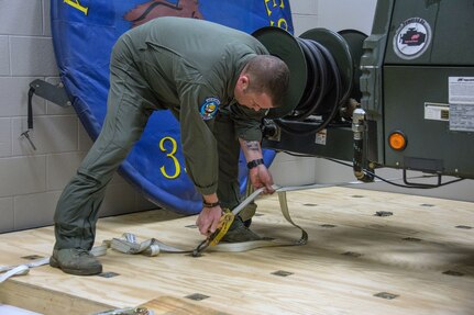 Neidhardt designed and built a faux floor of a KC-135 to use as a cargo loading training simulator.