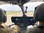 Chief Warrant Officer 5 Jay Enders, Charlie Co. 1st Battalion, 112th Aviation conducts a test flight in a LH-72 "Lakota" with his Thai counterpart on January 17, at the Royal Thai Army Aviation base in Lop Buri, Thailand.