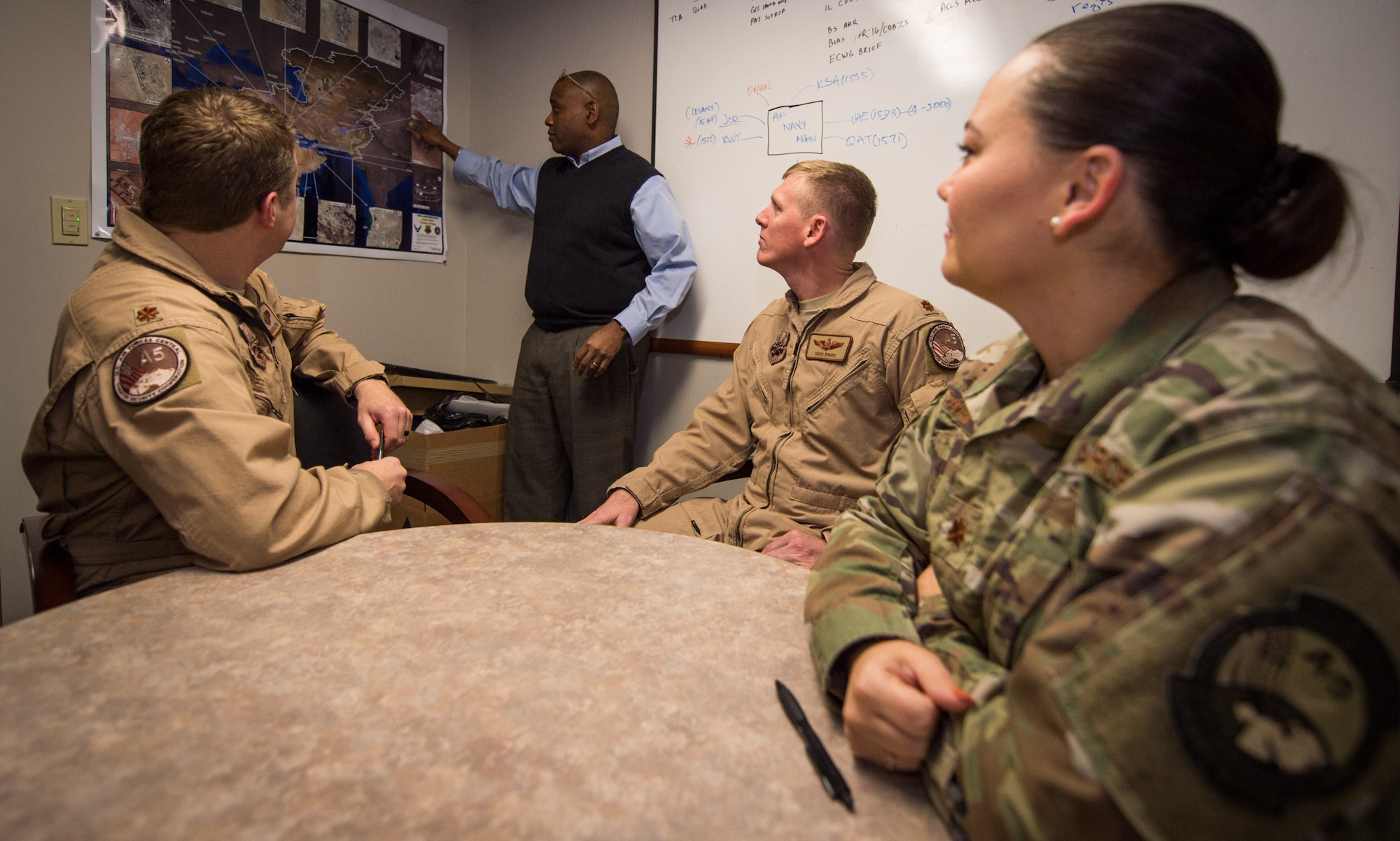 U.S. Air Force Col. Cherron Galluzzo, left, U.S. Air Forces Central Command (AFCENT) Surgeon General (SG) Directorate deputy command surgeon, and Gary Frunz, AFCENT SG Directorate medical operations and planning analyst, discuss medical capabilities and mission readiness at Shaw Air Force Base, S.C., Jan. 17, 2019. AFCENT Shaw’s staff is made up of active duty, civilian, contractor, guard and reserve members. (U.S. Air Force photo by Staff Sgt. Areca T. Bell)