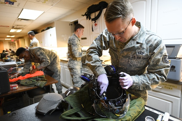 388th Operations Support Squadron Aircrew Flight Equipment shop, works on flight equipment, Nellis Air Force Base, Nevada, Feb. 5, 2019. AFE Airmen manage, check and prepare gear pilots need to fly and also survive in the event of an emergency. (U.S. Air Force photo by R. Nial Bradshaw)