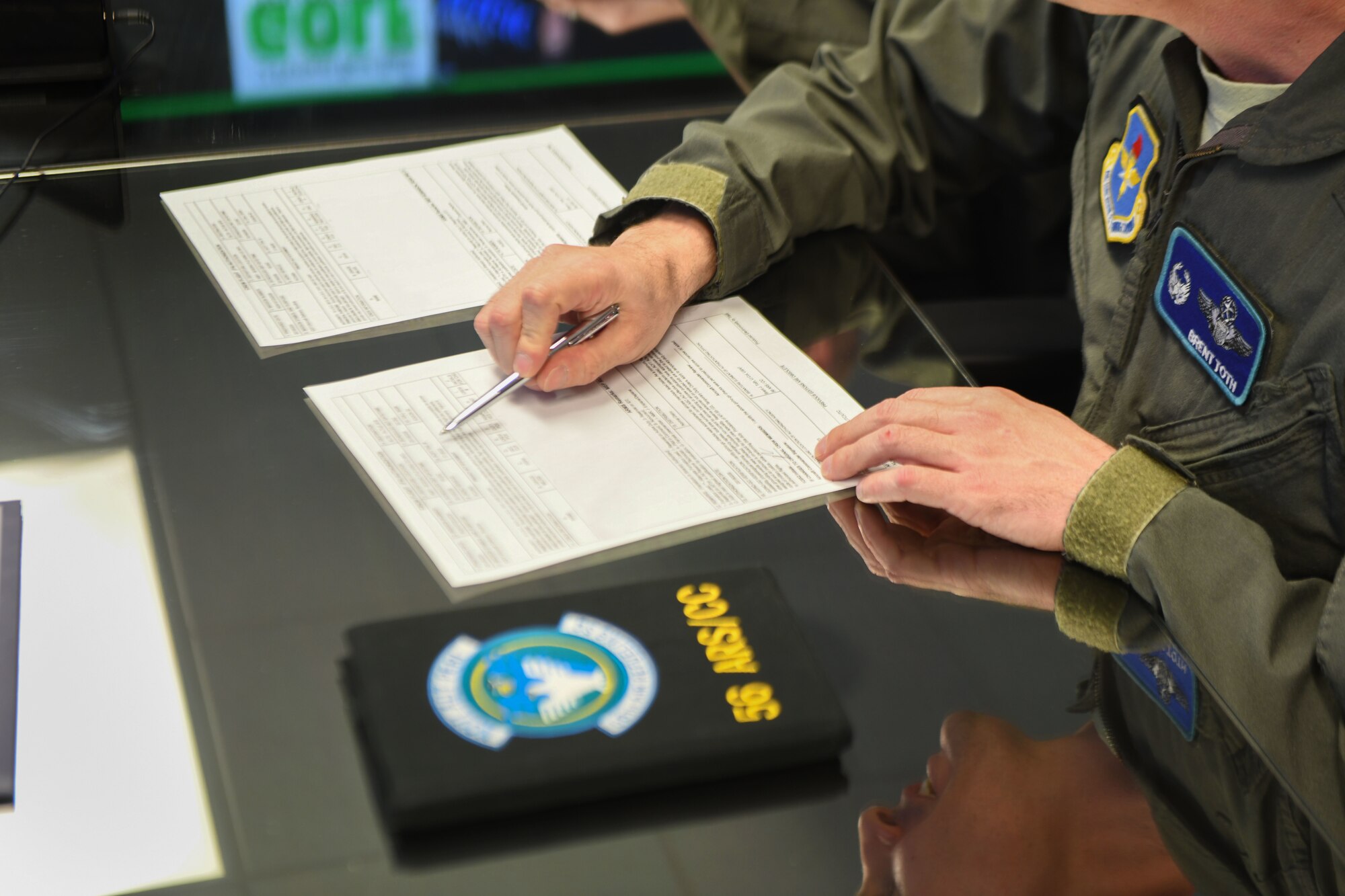 U.S. Air Force Lt. Col. Brent Toth, 56th Air Refueling Squadron commander, signs the first set of flight orders for the incoming KC-46A Pegasus, Feb. 4, 2019, at Altus Air Force Base, Okla. The flight orders are for the crew that will be flying the KC-46 from Washington State to Altus AFB. (U.S. Air Force photo by Airman 1st Class Jeremy Wentworth)