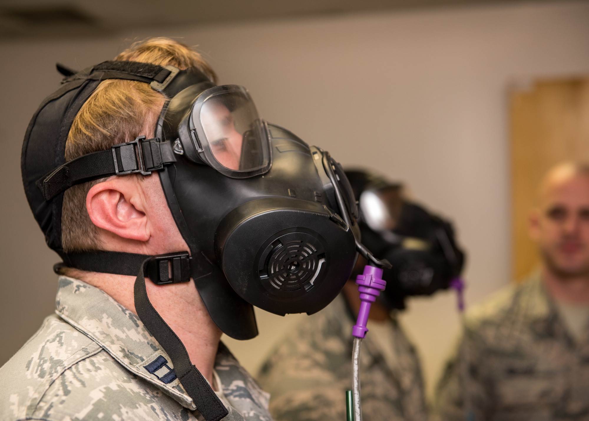 U.S. Air Force Airmen take the gas mask fit test at Joint Base Langley-Eustis, Virginia, Feb. 5, 2019.