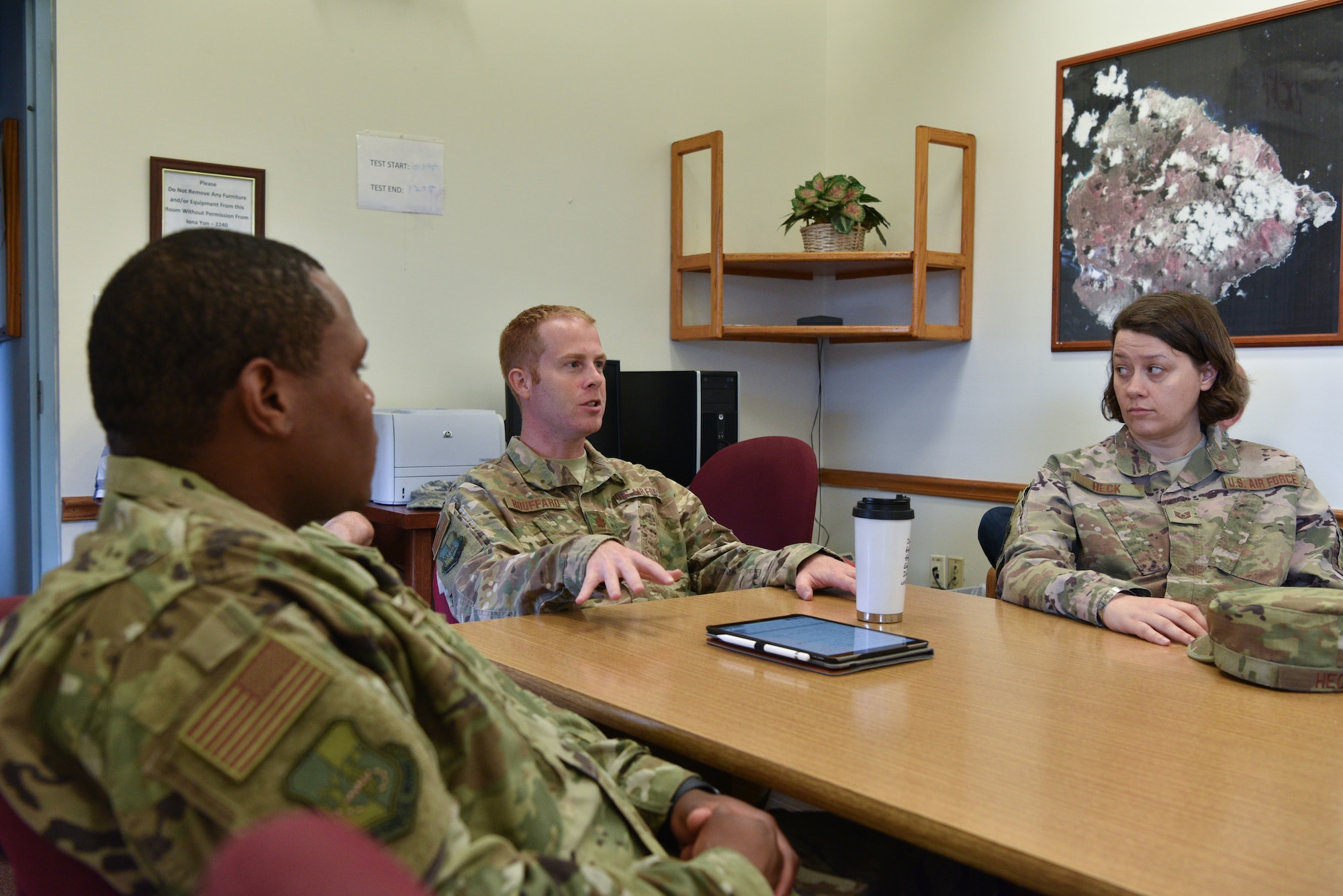 45th Mission Support Group, Detachment 2, holds an meeting, January 14, 2019 at Ascension Island Auxiliary Airfield. Det 2 works with various organizations including the Royal Air Force and Air Force Technical Applications Center. (U.S. Air Force photo by Airman 1st Class Dalton Williams)