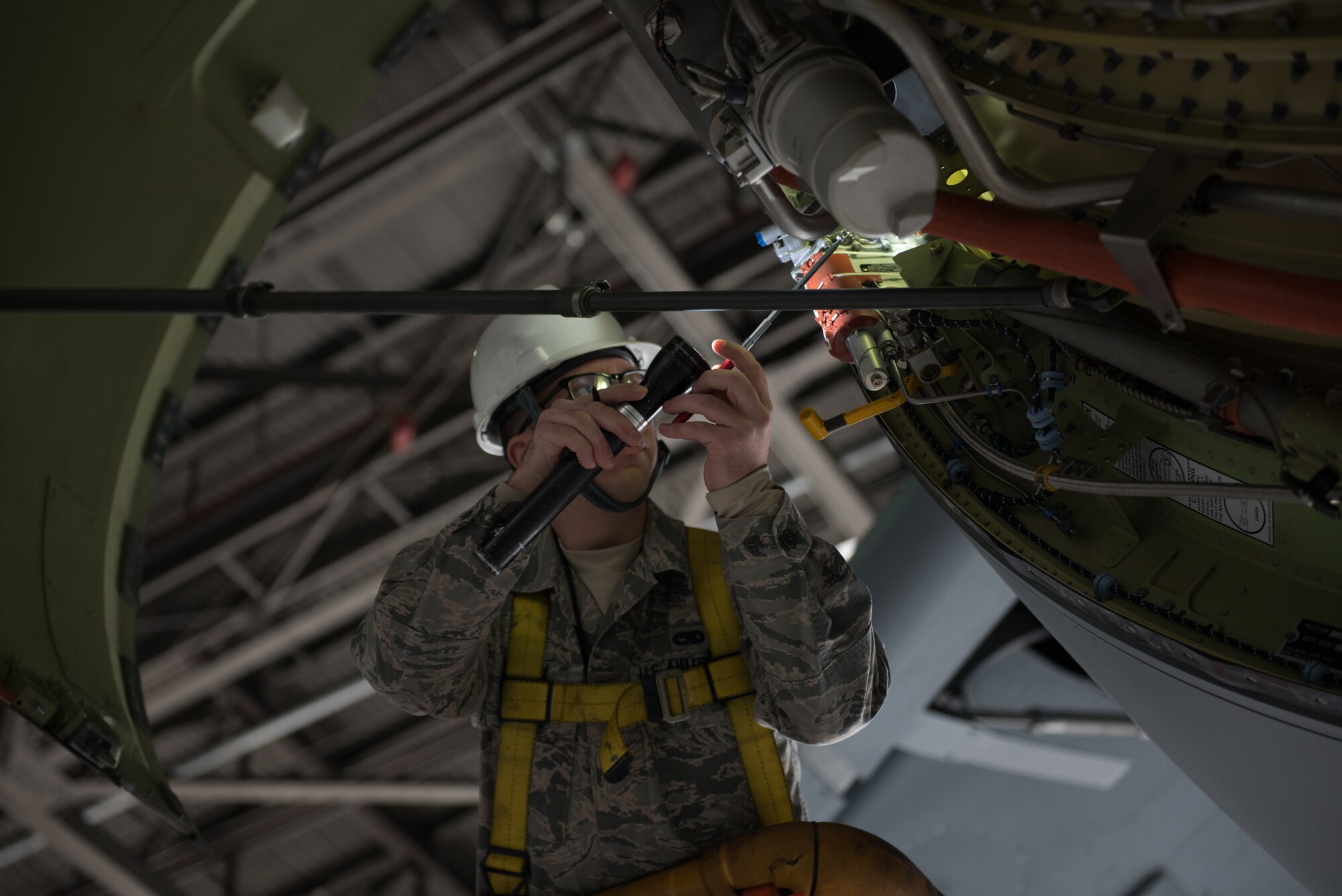 U.S. Air Force Senior Airman Matthew Malich, 60th Aircraft Maintenance Squadron aerospace propulsion journeyman, inspects a C-5M Super Galaxy Jan. 28, 2019 at Travis Air Force Base, Calif. Regular maintenance ensures the C-5 is mission ready and the 60th Maintenance Group's Maintenance Operations Center coordinates all maintenance actions at Travis. (U.S. Air Force photo by Tech. Sgt. James Hodgman)