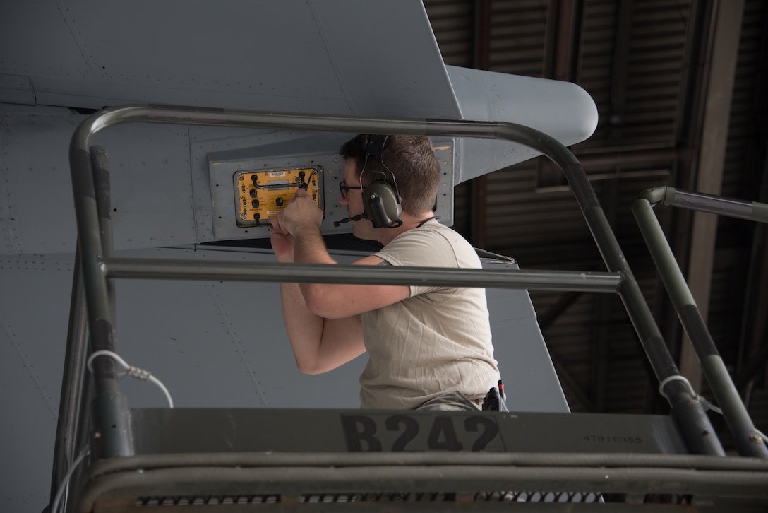 U.S. Air Force Senior Airman Neil Conaway, 60th Aircraft Maintenance Squadron communication and navigation systems specialist, inspects a C-5M Super Galaxy Jan. 28, 2019 at Travis Air Force Base, Calif. Regular maintenance ensures the C-5 is mission ready and the 60th Maintenance Group's Maintenance Operations Center coordinates all maintenance actions at Travis. (U.S. Air Force photo by Tech. Sgt. James Hodgman)