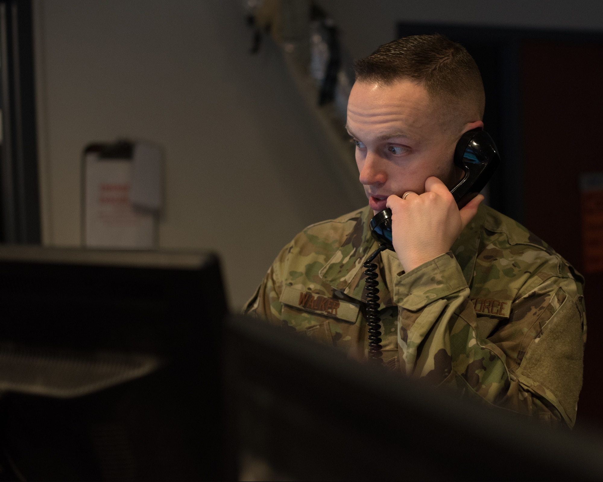 U.S. Air Force Staff Sgt. Gabriel Walker, 60th Maintenance Group Maintenance Operations Center senior maintenance controller, coordinates with higher headquarters to send a maintenance recovery team to Joint Base Pearl Harbor-Hickam, Hawaii, Jan. 25, 2019 at Travis Air Force Base, Calif. The MOC coordinates maintenance actions for all aircraft at Travis and Travis aircraft flying missions all over the world. (U.S. Air Force photo by Tech. Sgt. James Hodgman)