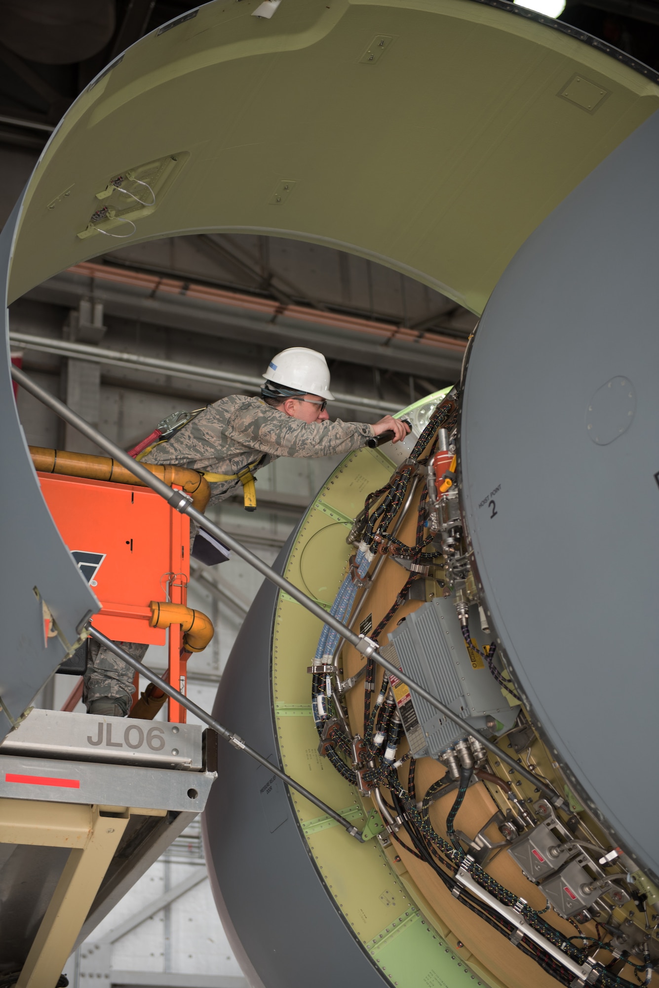 U.S. Air Force Senior Airman Matthew Malich, 60th Aircraft Maintenance Squadron aerospace propulsion journeyman, inspects a C-5M Super Galaxy Jan. 28, 2019 at Travis Air Force Base, Calif. Regular maintenance ensures the C-5 is mission ready and the 60th Maintenance Group's Maintenance Operations Center coordinates all aircraft maintenance actions at Travis. (U.S. Air Force photo by Tech. Sgt. James Hodgman)