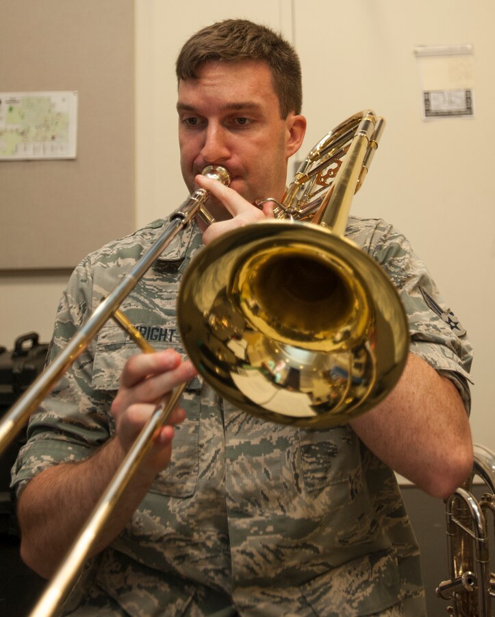 U. S. Air Force Senior Airman James Wright, a trombonist with the United States Air Force Band of the Golden West, rehearses with other members of the Travis Brass Quintet at Travis Air Force Base, Calif., Aug. 7, 2017. One of the cornerstone ensembles for the U. S. Band of the Golden West, Travis Brass has been delighting audiences in the Western U.S. for several decades. The brass quintet is made up of two trumpets, a horn, a trombone and a tuba. (U.S. Air Force photo/ Heide Couch)