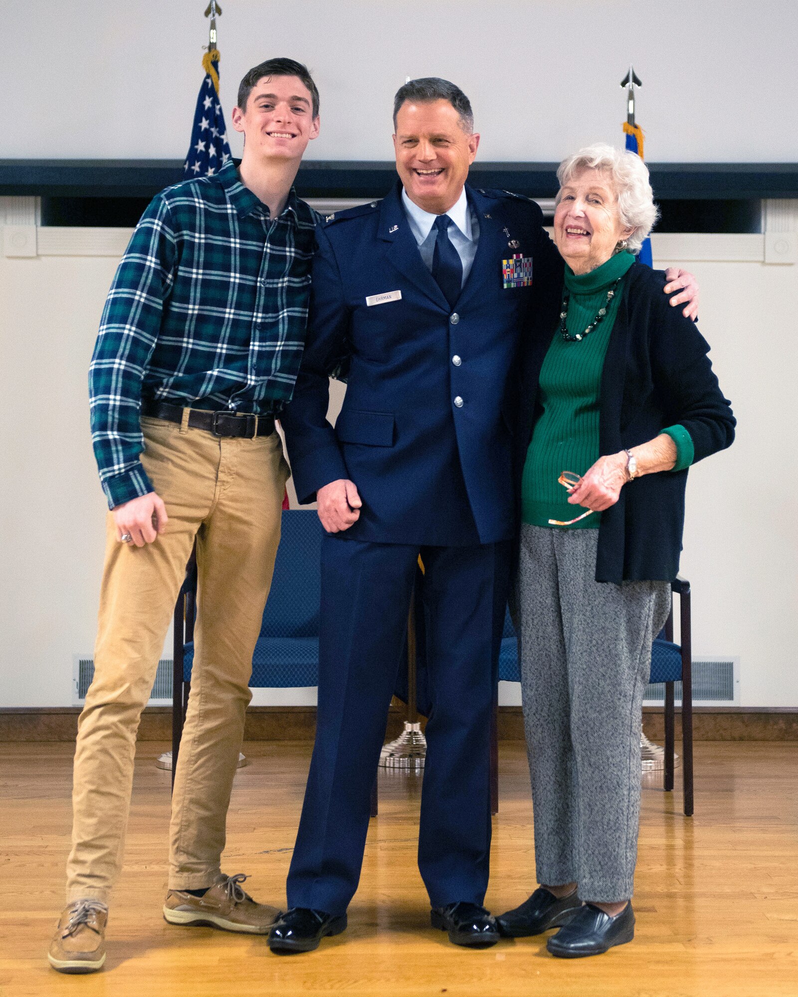 Chaplain Fred Ehrman is promoted to the rank of colonel with the help of family members during a ceremony at the Kentucky Air National Guard Base in Louisville, Ky., Jan. 5, 2019. Ehrman, who previously served as chaplain at the Kentucky Air Guard's 123rd Airlift Wing, is now Air National Guard assistant to the chaplain, U.S. Air Forces Europe and Air Forces Africa.