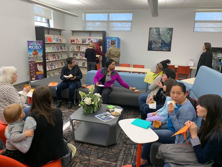 Patrons and employees of the Joint Base Charleston Air Base Library enjoy a tour of the newly renovated library as well as snacks and social time. The just reopened Air Base Library has been upgraded with new carpet, paint and furniture and will be more flexible not only for readers, but for events to be held at the facility. The renovation was part of an Air Force initiative  to modernize base libraries.