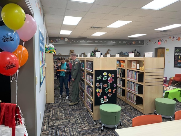 Patrons and employees of the Joint Base Charleston Air Base Library enjoy a tour of the newly renovated library as well as snacks and social time. The just reopened Air Base Library has been upgraded with new carpet, paint and furniture and will be more flexible not only for readers, but for events to be held at the facility. The renovation was part of an Air Force initiative  to modernize base libraries.