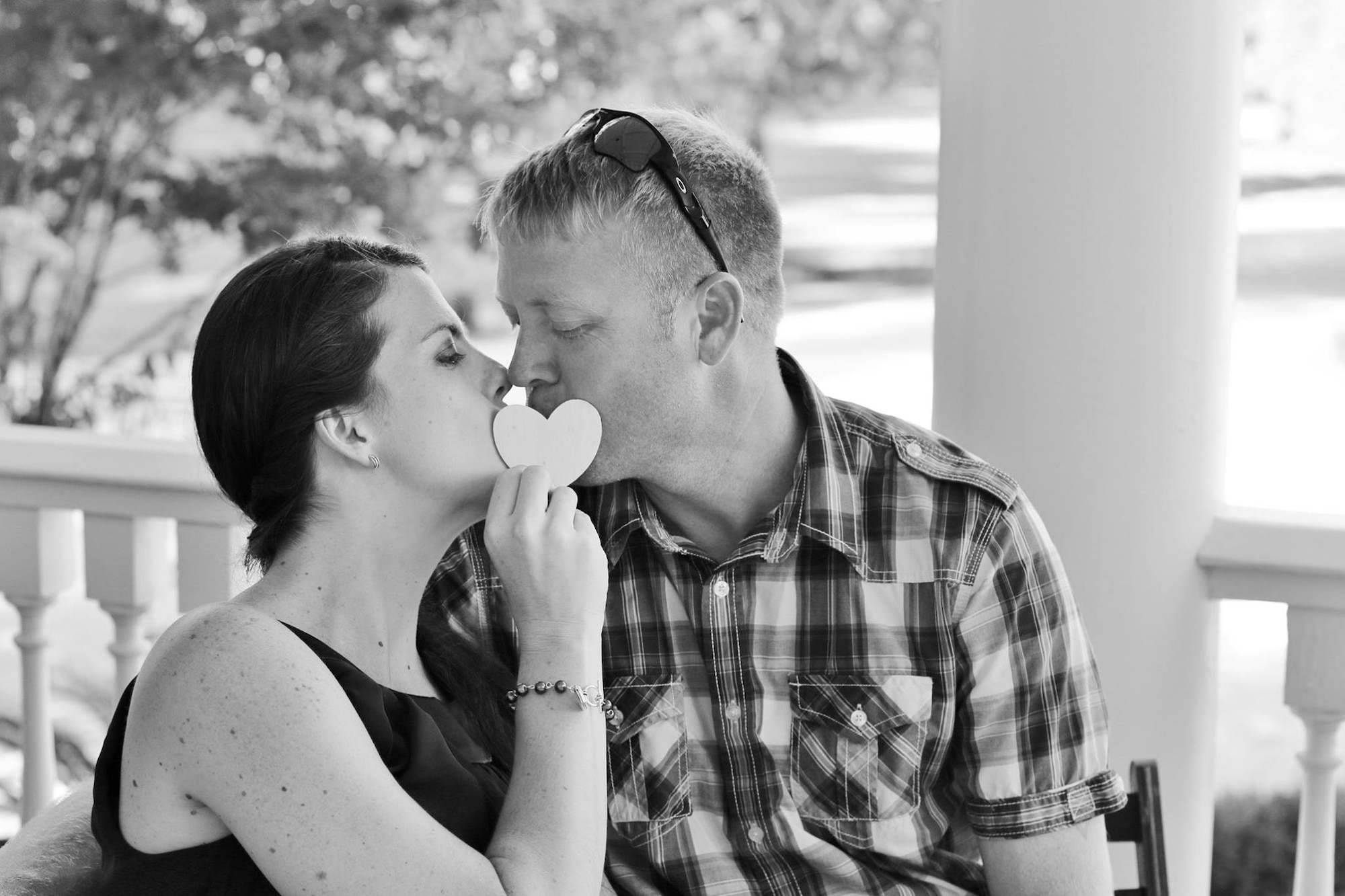 U.S. Air Force Tech Sgt. Jason Kelley, 633rd CES NCO in charge of pavements and equipment, and his wife Carrie Kelley share an embrace during their best friend’s wedding July 3, 2015 in Charleston, SC. Jason and Carrie started dating in 2006 and were married for 10 years. (Courtesy photo)