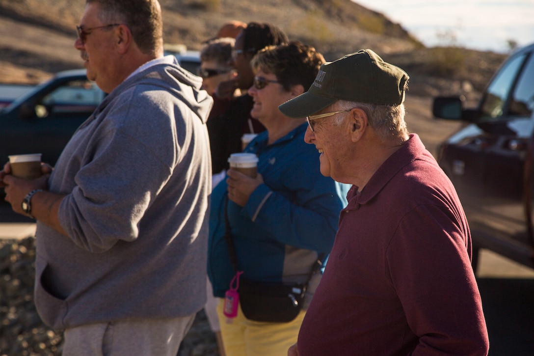 Guests participating in the Marine Corps Air Station (MCAS) Yuma Winter Tours observe a demonstration of the obstacle course, the Marine Corps Martial Arts Program (MCMAP), and a military working dog demonstration at various locations on MCAS Yuma, Ariz., Jan.9, 2019. Col. David A. Suggs, the station commanding officer, resumed the tours in 2018 to strengthen the relationship with the outside community and give them the opportunity to see what the Marines aboard the air station do. (U.S. Marine Corps photo taken by Cpl. Isaac D. Martinez)