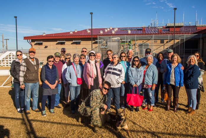 Guests participating in the Marine Corps Air Station (MCAS) Yuma Winter Tours observe a demonstration of the obstacle course, the Marine Corps Martial Arts Program (MCMAP), and a military working dog demonstration at various locations on MCAS Yuma, Ariz., Jan.9, 2019. Col. David A. Suggs, the station commanding officer, resumed the tours in 2018 to strengthen the relationship with the outside community and give them the opportunity to see what the Marines aboard the air station do. (U.S. Marine Corps photo taken by Cpl. Isaac D. Martinez)