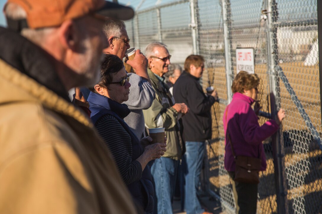 Guests participating in the Marine Corps Air Station (MCAS) Yuma Winter Tours observe a demonstration of the obstacle course, the Marine Corps Martial Arts Program (MCMAP), and a military working dog demonstration at various locations on MCAS Yuma, Ariz., Jan.9, 2019. Col. David A. Suggs, the station commanding officer, resumed the tours in 2018 to strengthen the relationship with the outside community and give them the opportunity to see what the Marines aboard the air station do. (U.S. Marine Corps photo taken by Cpl. Isaac D. Martinez)