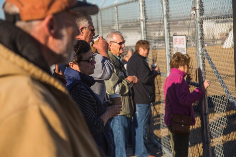 Guests participating in the Marine Corps Air Station (MCAS) Yuma Winter Tours observe a demonstration of the obstacle course, the Marine Corps Martial Arts Program (MCMAP), and a military working dog demonstration at various locations on MCAS Yuma, Ariz., Jan.9, 2019. Col. David A. Suggs, the station commanding officer, resumed the tours in 2018 to strengthen the relationship with the outside community and give them the opportunity to see what the Marines aboard the air station do. (U.S. Marine Corps photo taken by Cpl. Isaac D. Martinez)