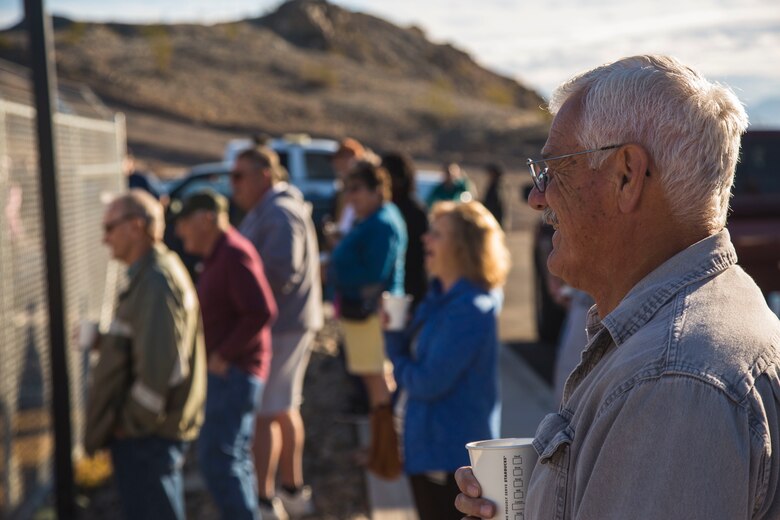 Guests participating in the Marine Corps Air Station (MCAS) Yuma Winter Tours observe a demonstration of the obstacle course, the Marine Corps Martial Arts Program (MCMAP), and a military working dog demonstration at various locations on MCAS Yuma, Ariz., Jan.9, 2019. Col. David A. Suggs, the station commanding officer, resumed the tours in 2018 to strengthen the relationship with the outside community and give them the opportunity to see what the Marines aboard the air station do. (U.S. Marine Corps photo taken by Cpl. Isaac D. Martinez)