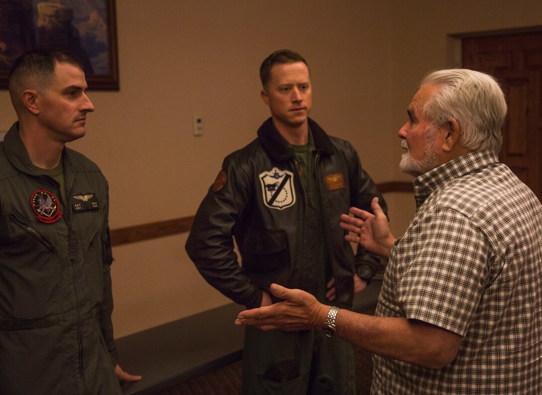 Guests participating in the Marine Corps Air Station (MCAS) Yuma Winter Tours observe a demonstration of the obstacle course, the Marine Corps Martial Arts Program (MCMAP), and a military working dog demonstration at various locations on MCAS Yuma, Ariz., Jan.9, 2019. Col. David A. Suggs, the station commanding officer, resumed the tours in 2018 to strengthen the relationship with the outside community and give them the opportunity to see what the Marines aboard the air station do. (U.S. Marine Corps photo taken by Cpl. Isaac D. Martinez)