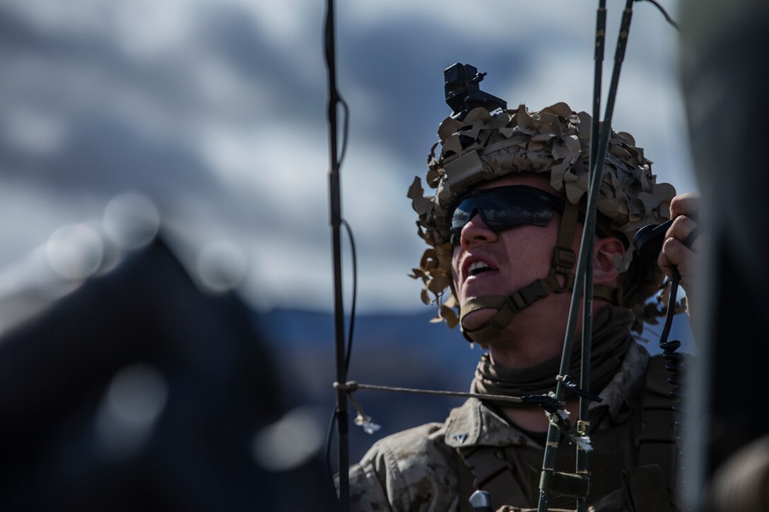 A U.S. Marine with 1st Battalion, 7th Marine Regiment, Marine Air-Ground Task Force-6 shouts emeny coordinates while participating in the Regimental Assault Course during Integrated Training Exercise 2-19 at Marine Corps Air-Ground Combat Center Twentynine Palms, Calif., Feb. 4, 2019. ITX creates a challenging, realistic training environment that produces combat-ready forces capable of operating as an integrated MAGTF.
