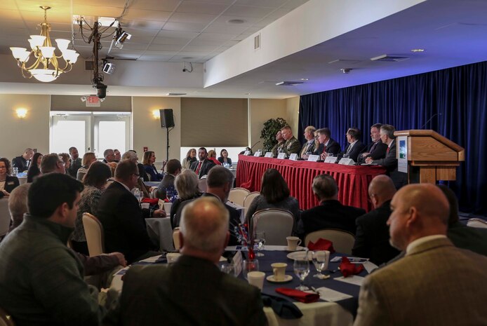 Col. Russell C. Burton, Marine Corps Air Station New River commanding officer, addresses local leaders and members of the community during the 24th annual State of the Community Breakfast at the Landing All Ranks Club on Marine Corps Air Station New River, Feb. 1, 2019. The event allowed leaders around the community to share information about the state of their respective organizations and their potential impact on the local area. (U.S. Marine Corps photo by Cpl. Jon Sosner)