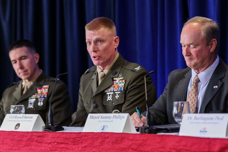 Col. Russell C. Burton, Marine Corps Air Station New River commanding officer, addresses local leaders and members of the community during the 24th annual State of the Community Breakfast at the Landing All Ranks Club on Marine Corps Air Station New River, Feb. 1, 2019. The event allowed leaders around the community to share information about the state of their respective organizations and their potential impact on the local area. (U.S. Marine Corps photo by Cpl. Jon Sosner)
