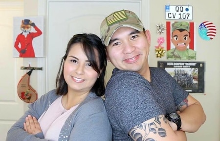 Staff Sgt. Archie Masibay poses for a photo with his wife, Flor.