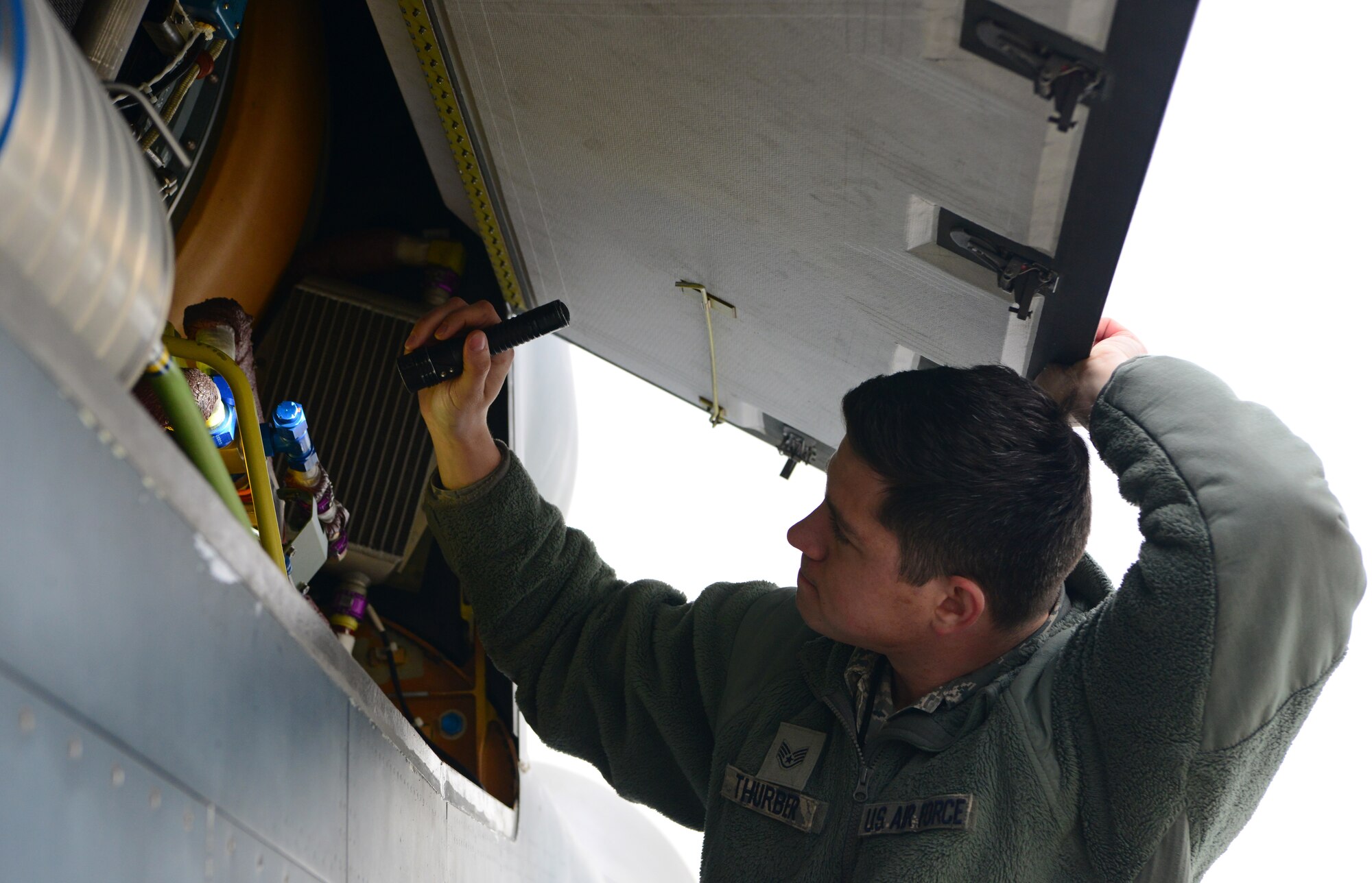 Staff Sgt. Seth Thurber, 69th Maintenance Squadron Detachment 1 RQ-4 Global Hawk avionics technician, performs a preflight inspection