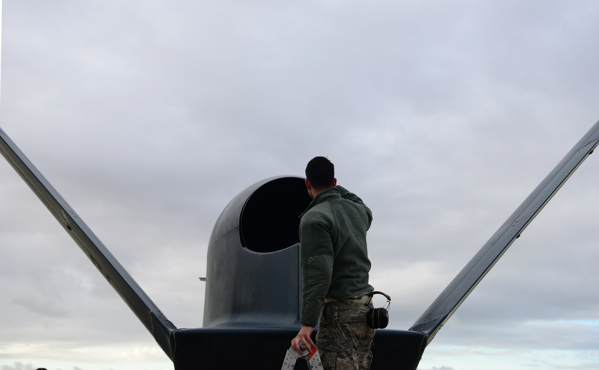 Staff Sgt. Seth Thurber, 69th Maintenance Squadron Detachment 1 RQ-4 Global Hawk avionics technician, performs a preflight inspection