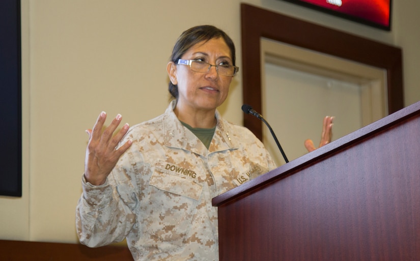 U.S. Marine Corps Col. Lina Downing, director of the Financial Management Division for Central Command, speaks to a crowd of finance and comptroller senior leaders during the U.S. Army Central Financial Management and Comptroller Forum at Al Udeid Air Base, Qatar, Dec. 3, 2018. Downing's team provides financial/fiscal guidance to U.S. ARCENT'S area of responsibility.
