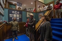 U.S. Marine Corps Sgt. Maj. Terrence C. Whitcomb, the sergeant major of 1st Marine Division (MARDIV), gives a tour of the unit's Headquarters Building to Division veterans during the week of the 1st MARDIV 78th anniversary at Marine Corps Base Camp Pendleton, California, Feb. 1, 2019.