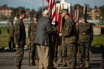 U.S. Marine Corps Maj. Gen. Robert F. Castellvi, the commanding general of 1st Marine Division (MARDIV), shakes hands with a veteran of the division during the 1st MARDIV 78th Anniversary Ceremony at Marine Corps Base Camp Pendleton, California, Feb. 1, 2018