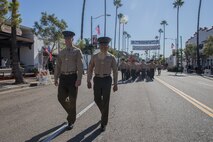 Marines from 2d Battalion 4th Marine Regiment and retired Marines parade in San Clemente, Calif., Nov. 9th, 2018.
