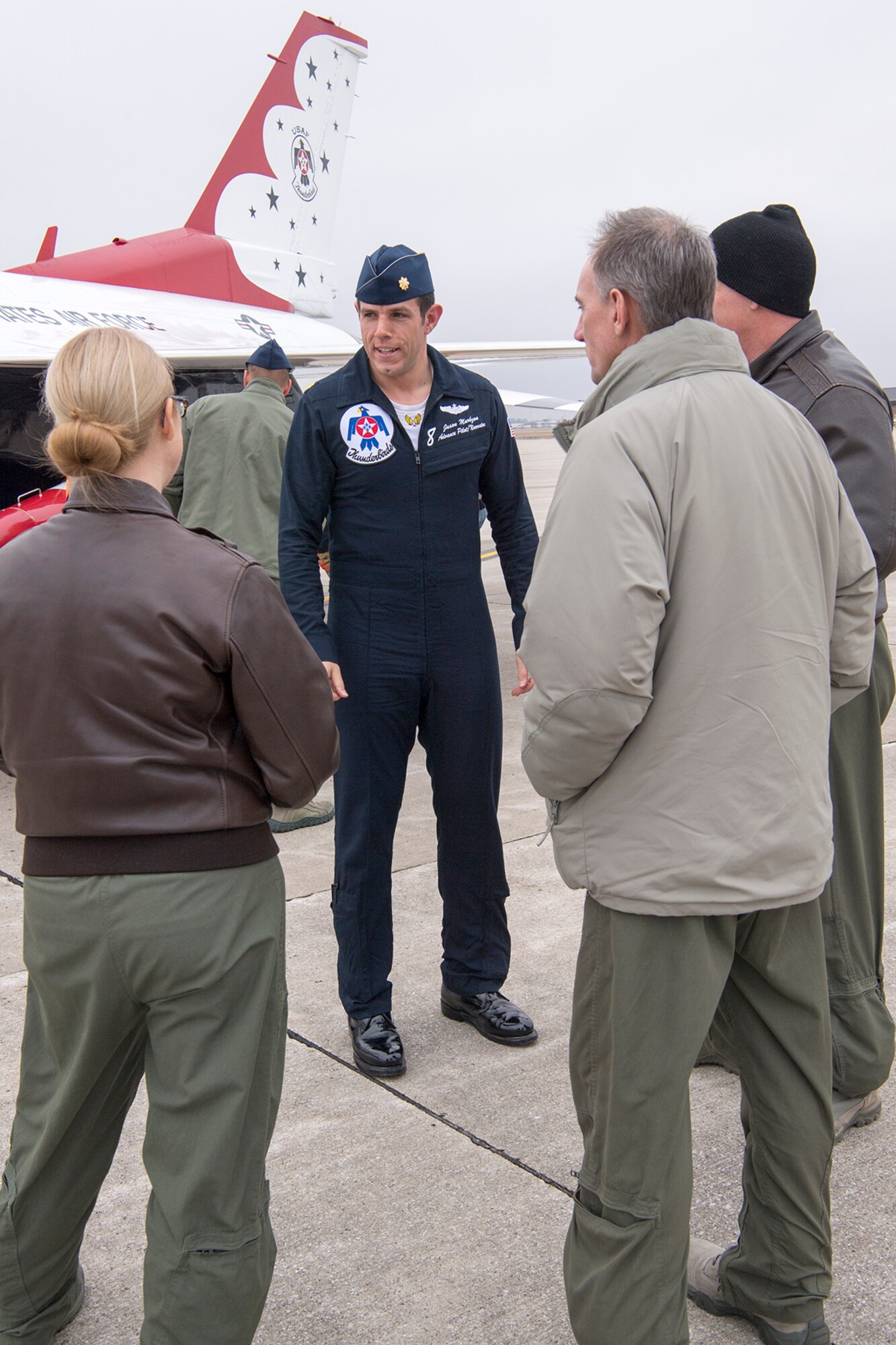 Maj. Jason Markzon, pilot of Thunderbird 8, talks with Grissom members upon his landing at Grissom Air Reserve Base, Ind., Feb. 5, 2019. Markzon visited the base in preparation for the Grissom Air and Space Expo scheduled for Sept. 7-8, 2019. (U.S. Air Force photo/Douglas Hays)