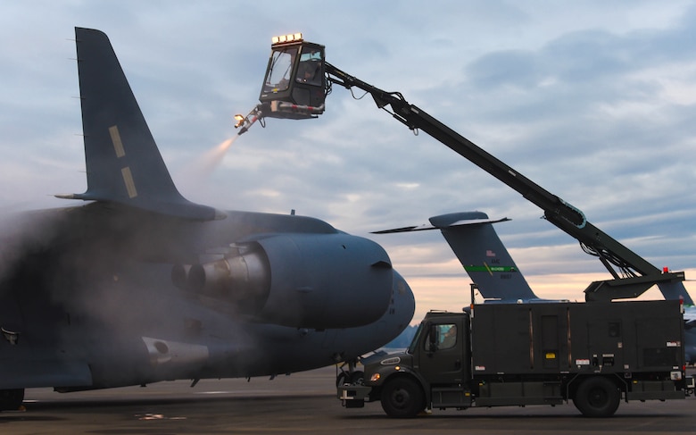 In order to make the aircraft safe to fly, Tech. Sgt. Salomon Gutierrez, 62nd Aircraft Maintenance Squadron noncommissioned officer in charge of Silver Flight, sprays a C-17 Globemaster III’s wing with deicing liquid at Joint Base Lewis-McChord, Wash., Jan. 16, 2019. Gutierrez and other 62nd AMXS Airmen deiced the wings and tail of the aircraft to make it safe to fly. (U.S. Air Force photo by Senior Airman Tryphena Mayhugh)
