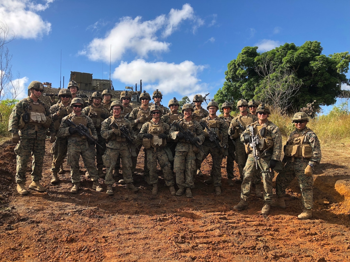 U.S. Marines Lt. Col. Warren C. Cook, Commanding Officer and SgtMaj Jose H. Molina, Sergeant Major for 2nd Battalion 4th Marines take a photo with Weapons Platoon while visiting Company F at Shoal Water Bay Training Area during Diamond Strike on May 30, 2018.