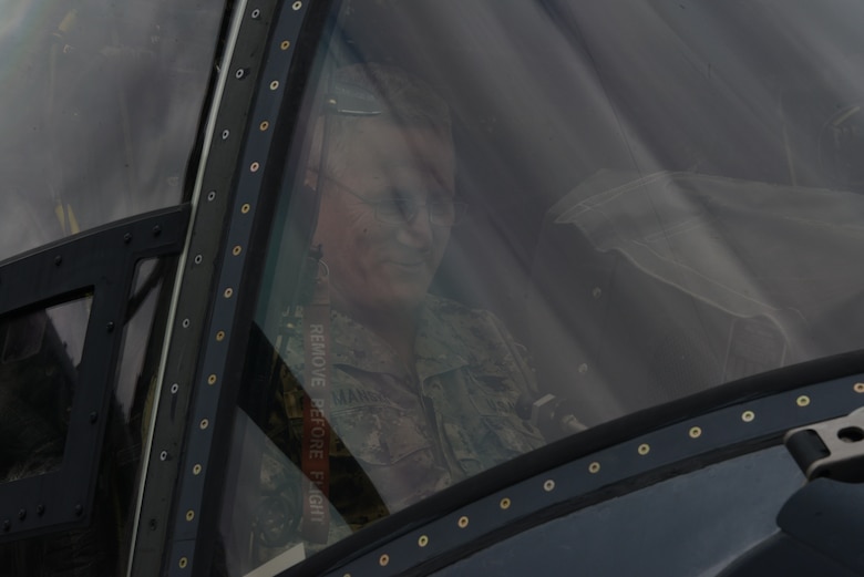 One person in the cockpit of an aircraft.