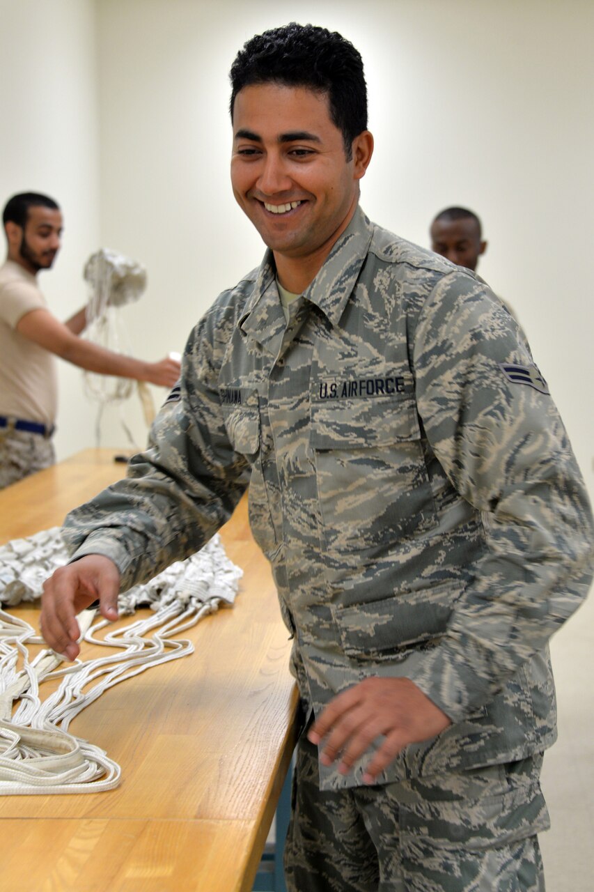 Airman trains in setting up an ejection seat.