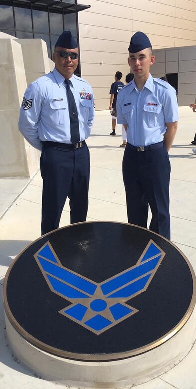 U.S. Air Force Tech. Sgt. Jonathan Herrera, poses with his son, Airman Basic Anthony Castro, during Castro’s Basic Military Training graduation at Lackland Air Force Base, Texas, July 1, 2016. Castro followed his father’s footsteps and joined the Air Force. (Courtesy photo)